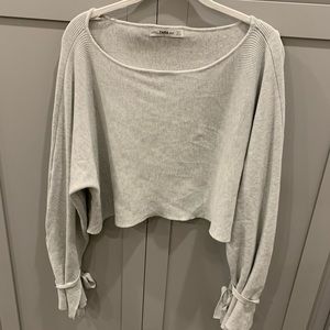 Zara Medium Knit cropped tie sleeve.